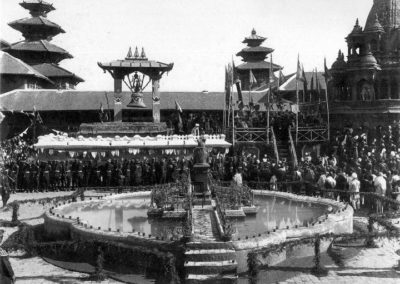 A festive occasion at Patan Durbar Square in 1910s. The pond is dedicated to the Prime Minister Chandra Shumshere's first queen. The statue in the middle of it has been transferred to the Patan Museum ca 1905