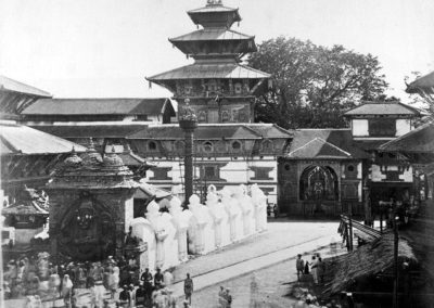 Hanuman Dhoka Palace during Indra Jatra festival in 1863AD taken by Captain DJ Morris. While the popular Kaal Bhairav image is on fore ground, on the background is the usually hidden large image of Swet Bhairab. Built by king Rana Bahadur Shah, it remains blocked form the view for public except during the Indra Jatra