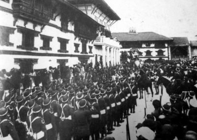 Parade before World war one in Kathamandu Durbar Square. Here, the currently non existant part and the old form of Gaddhi Baithak can be seen