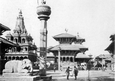 Patan Durbar Square from the south, in the early 1920s. The statue in the foreground is that of Yog Narendra Malla, grandson of Siddhi Narsingh Malla