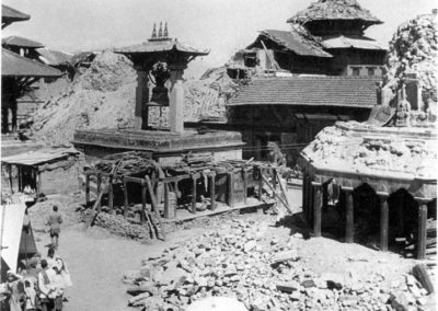 The destruction that occurred during the earthquake to Patan Dubar Square around the Taleju Bell